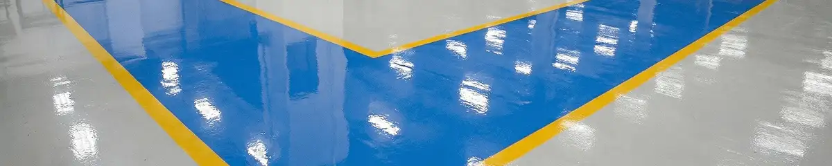 A factory floor professionally covered and marked with epoxy flooring in Sioux Falls, SD