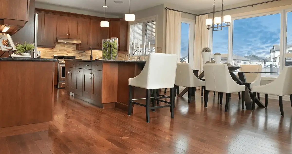 A modern kitchen with professionally installed wood flooring in Sioux Falls, SD