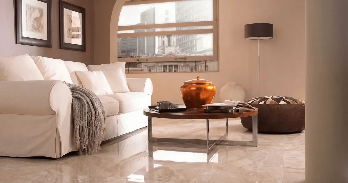 Modern living room with professionally installed marble flooring, a beige sofa, coffee table in Sioux Falls, SD