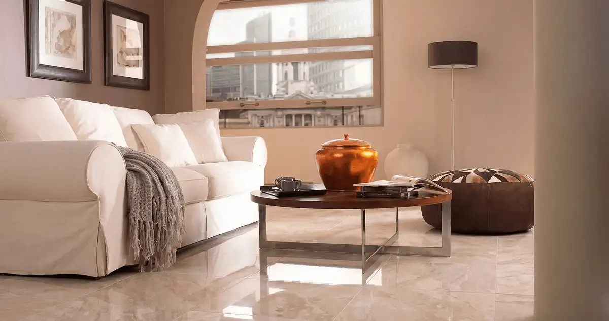 Modern living room with professionally installed marble flooring, a beige sofa, coffee table in Sioux Falls, SD