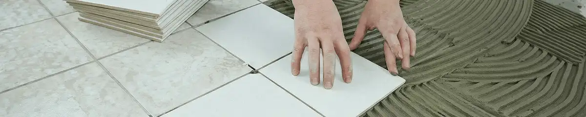 Professional installing white tile floors in Sioux Falls, SD